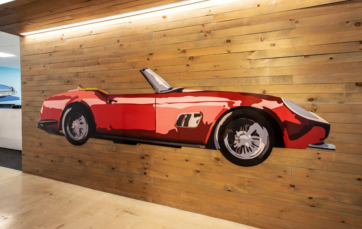 Corporate interior projects benefit from custom graphics such as this sports car wall graphic