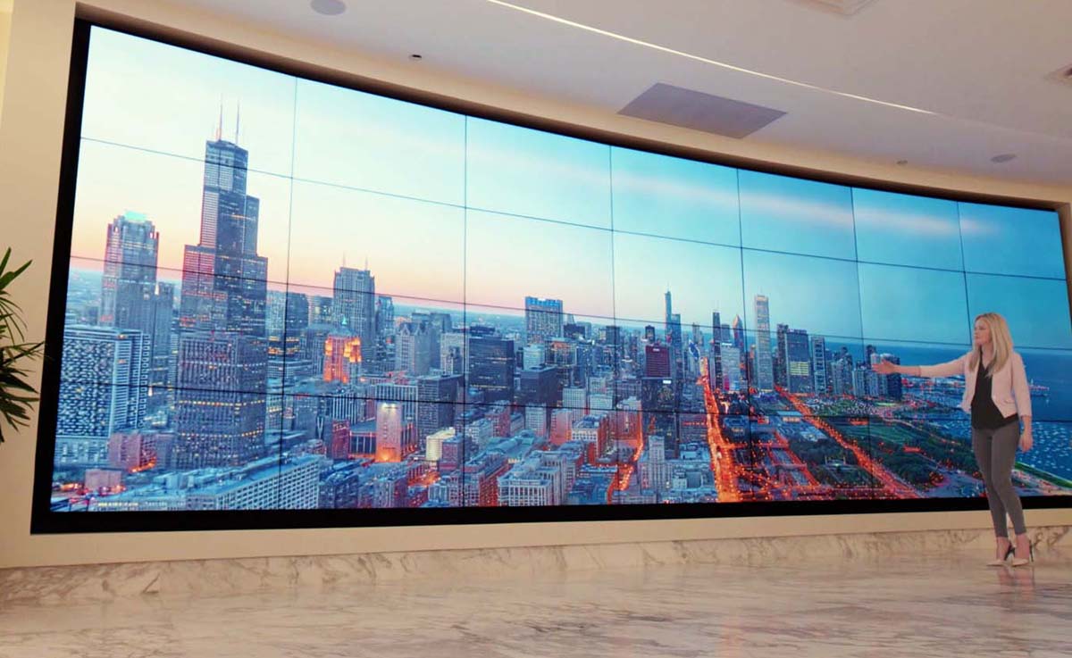 a dynamic LED video wall gives guests a preview of views from a new high rise in Chicago